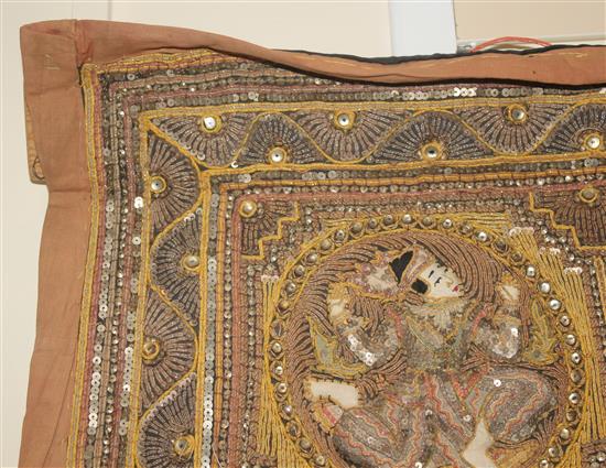 An early 20th century rectangular Thai wall hanging, 7ft 11in. x 4ft 7in.